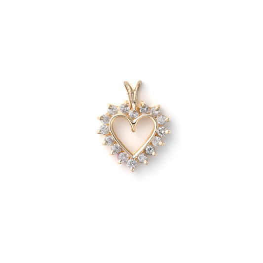 Heart-shaped yellow gold necklace with round diamonds.