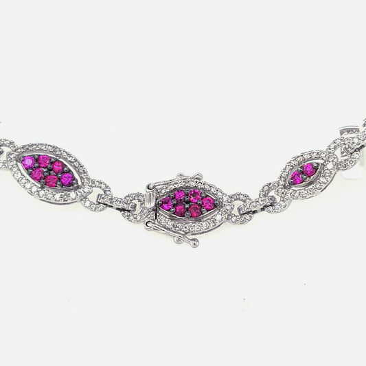 14K white gold bracelet with rubies.