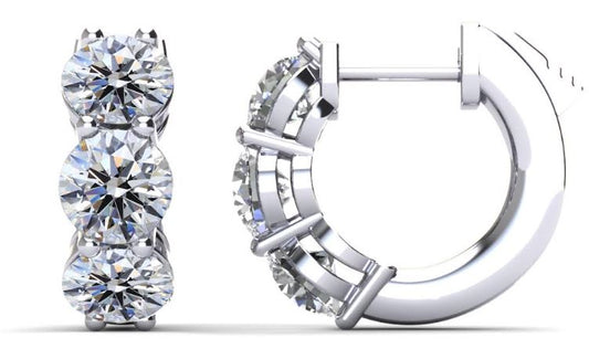 14K white gold huggie earrings with diamonds.