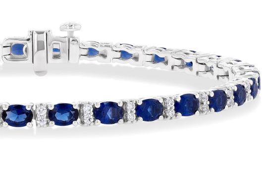 Oval sapphire and diamond station bracelet.