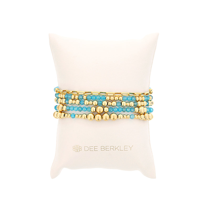 Stretch Color Gemstone Bracelet in Gold Filled Yellow with 40 Round Blue Topazs