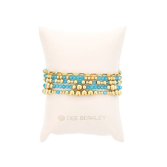 Gold-filled bracelet with blue topaz stones.