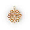 Estate Pins & Brooches Victorian 14 Karat Yellow Floral Pin/ Pendant with 7 Round Diamonds, Color: I/J, Clarity: SI2, totaling 0.74ctw