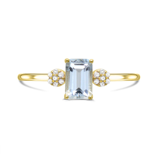 Emerald aquamarine ring with diamond accents.