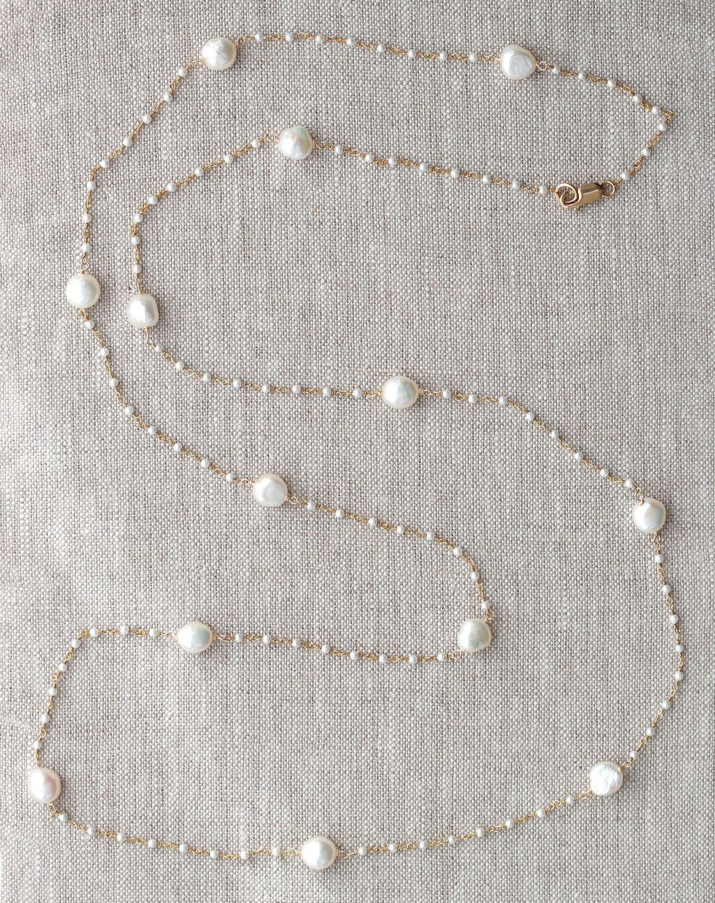 Gold-filled necklace with baroque white pearls.