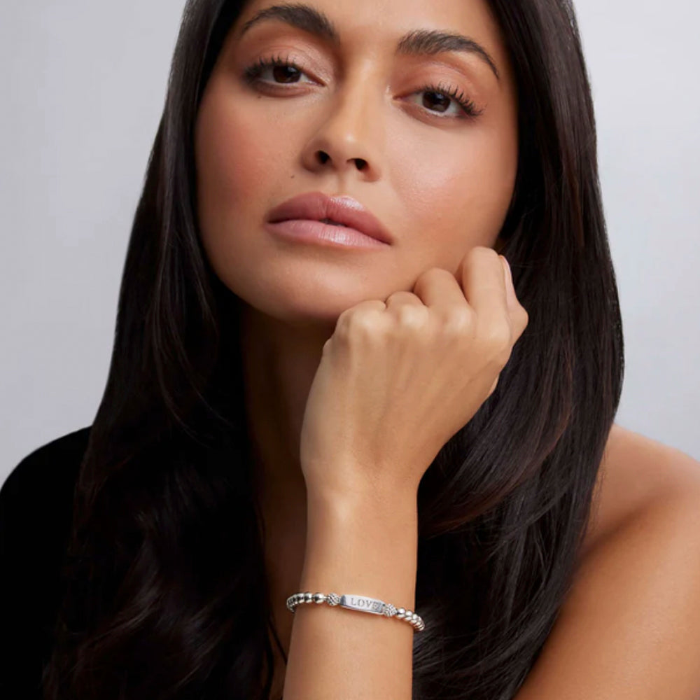 Sterling silver stretch bracelet on wrist.