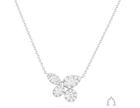 Diamond cluster necklace with teardrop accents.