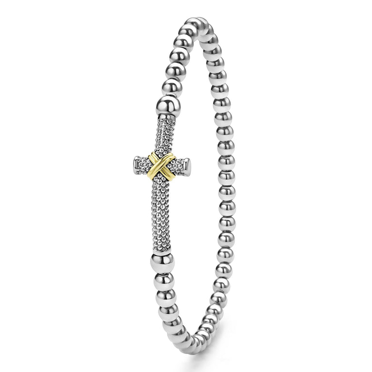 Sterling silver bracelet with gold accents.