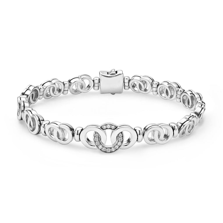 Sterling silver bracelet with diamond-accented links.