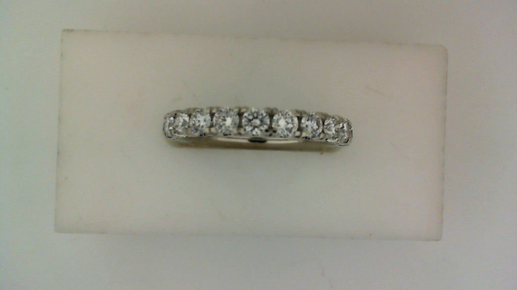 White gold band with round diamonds.