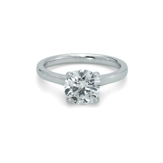 Solitaire lab-grown diamond engagement ring.