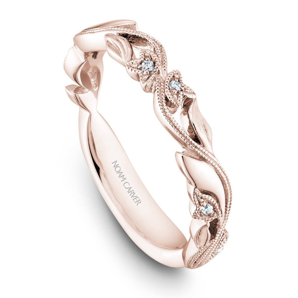 Rose gold band with floral diamond accents.