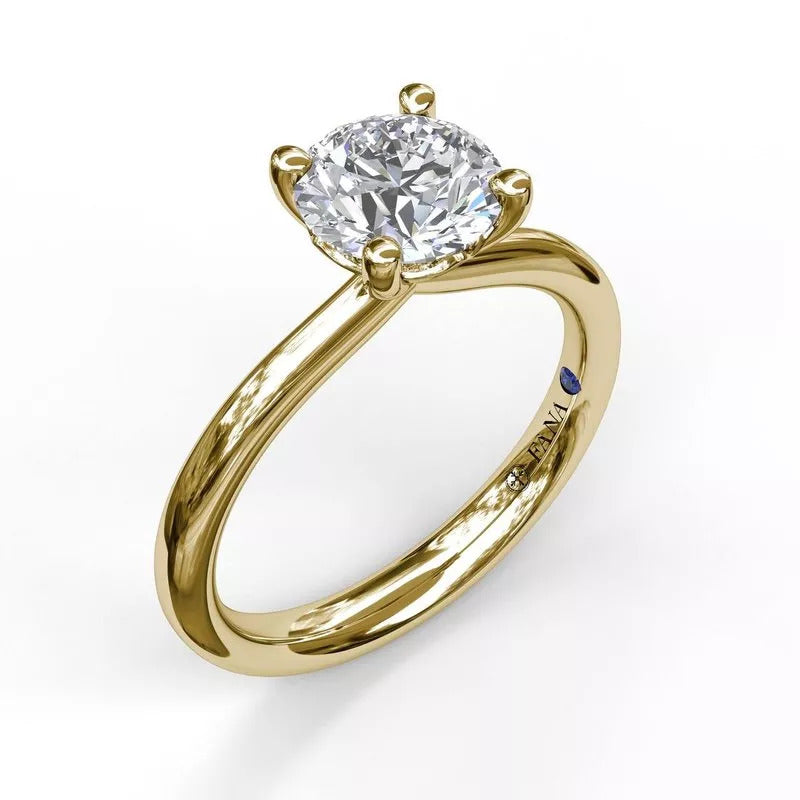 14K yellow gold solitaire engagement ring.