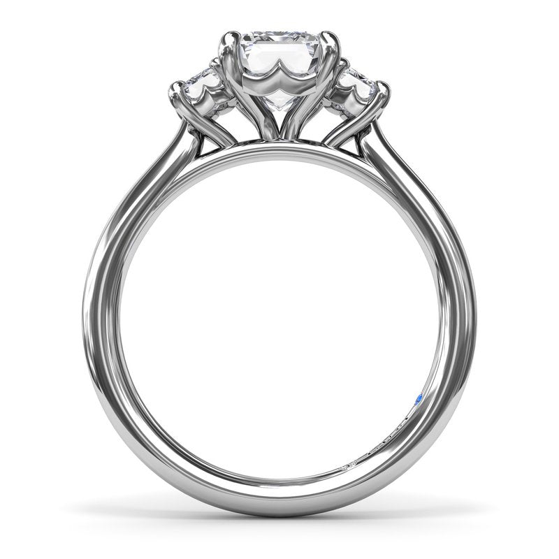 Three-stone diamond ring, white gold band.