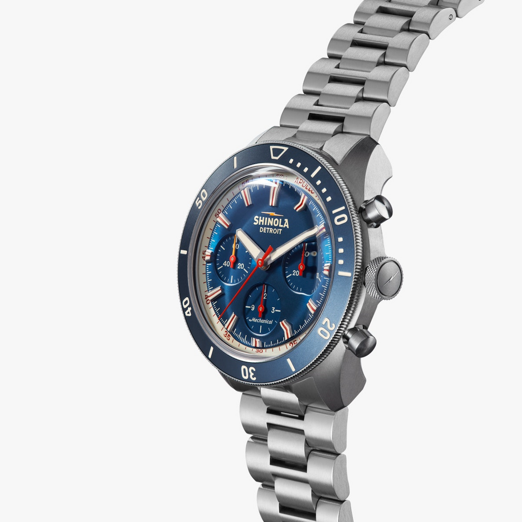 Blue dial titanium watch with sapphire crystal.