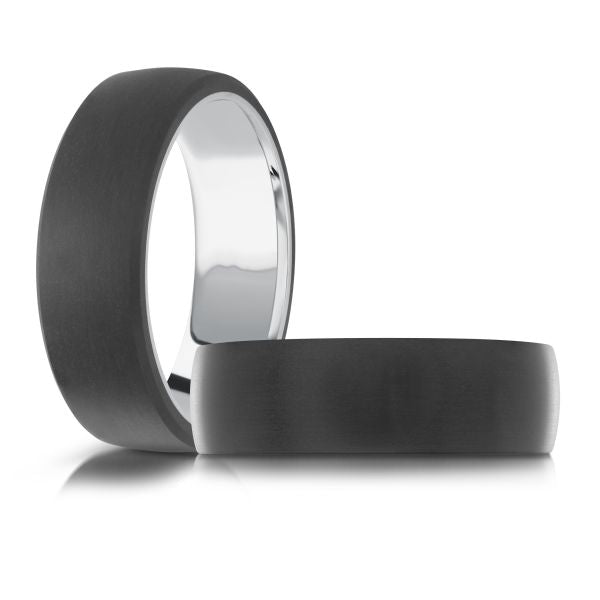 Black carbon fiber and white gold band.