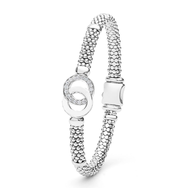 Sterling silver bracelet with diamond accents.