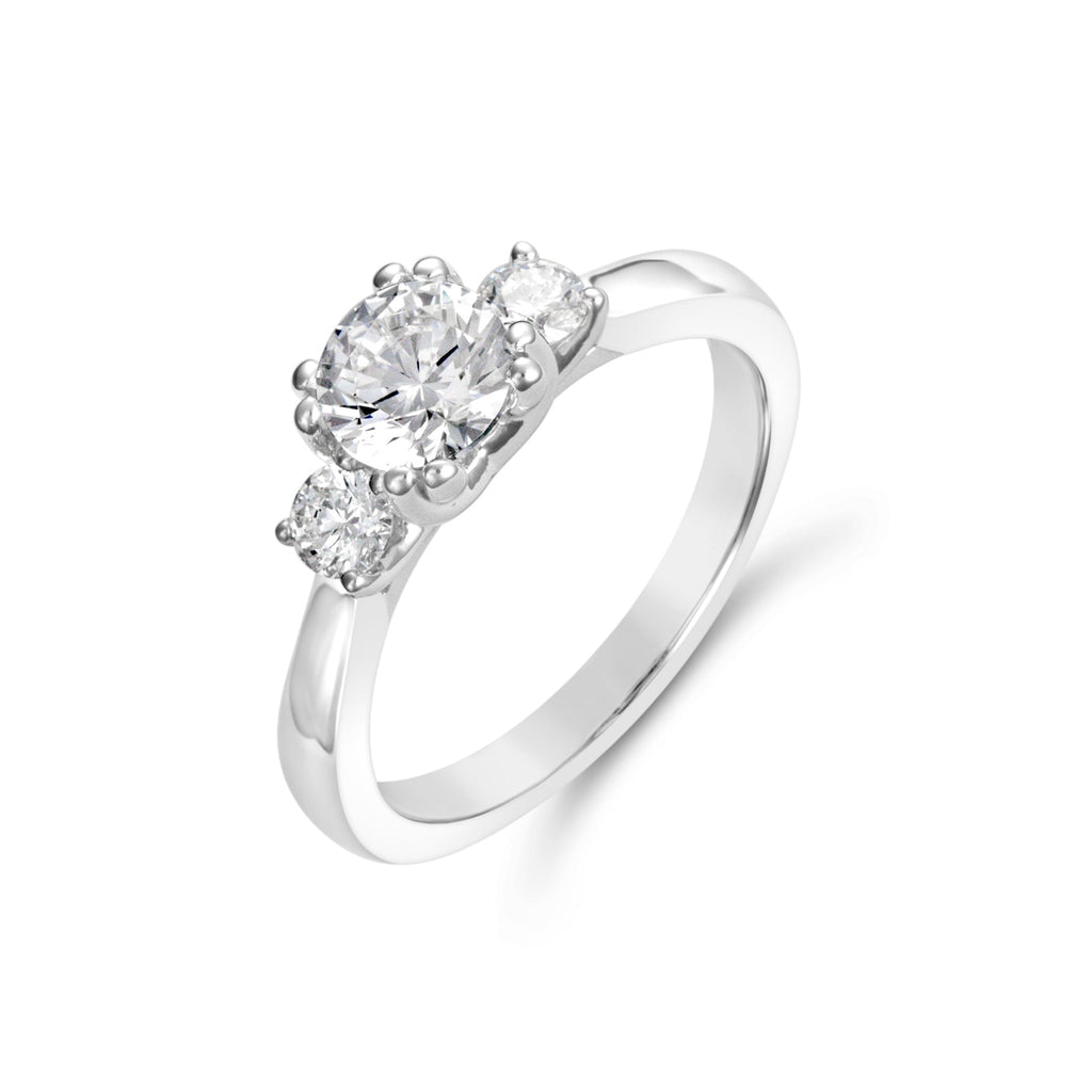 Three-stone diamond ring in white gold.