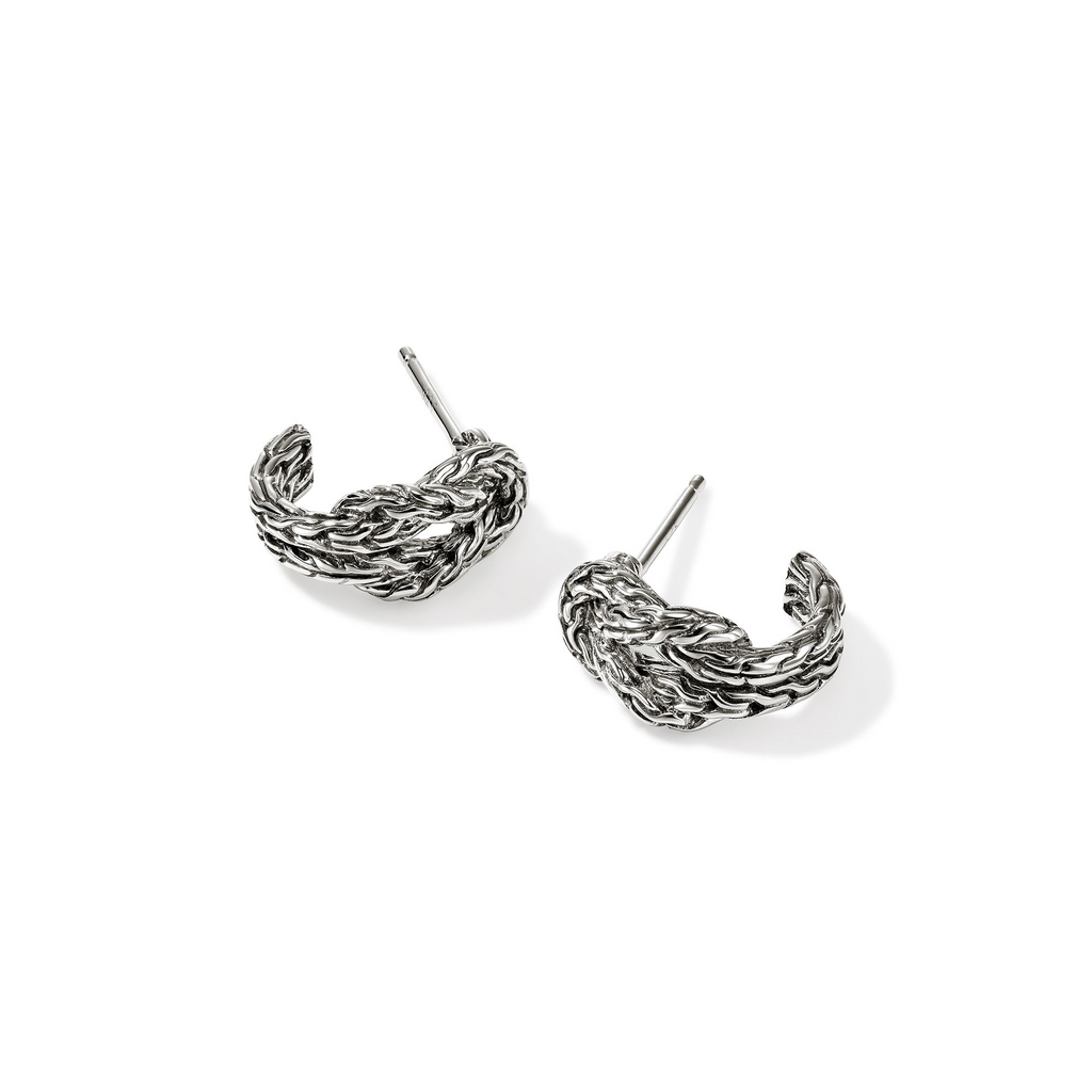 Sterling silver twisted J hoop earrings.