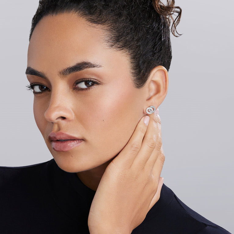 Sterling silver diamond stud earrings.
