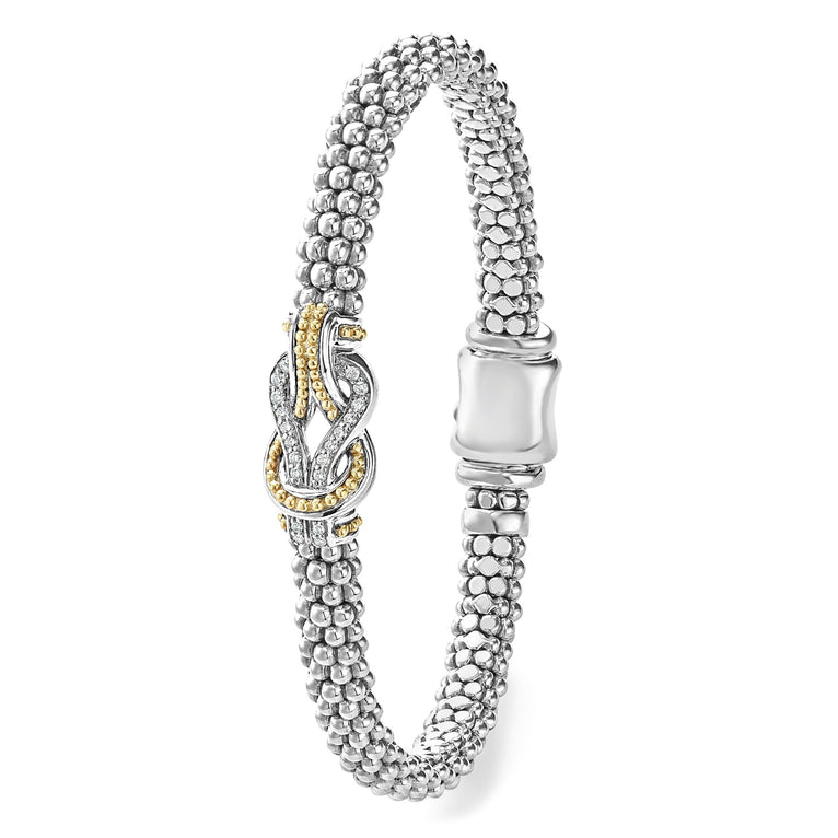 Sterling silver bracelet with diamond accents.