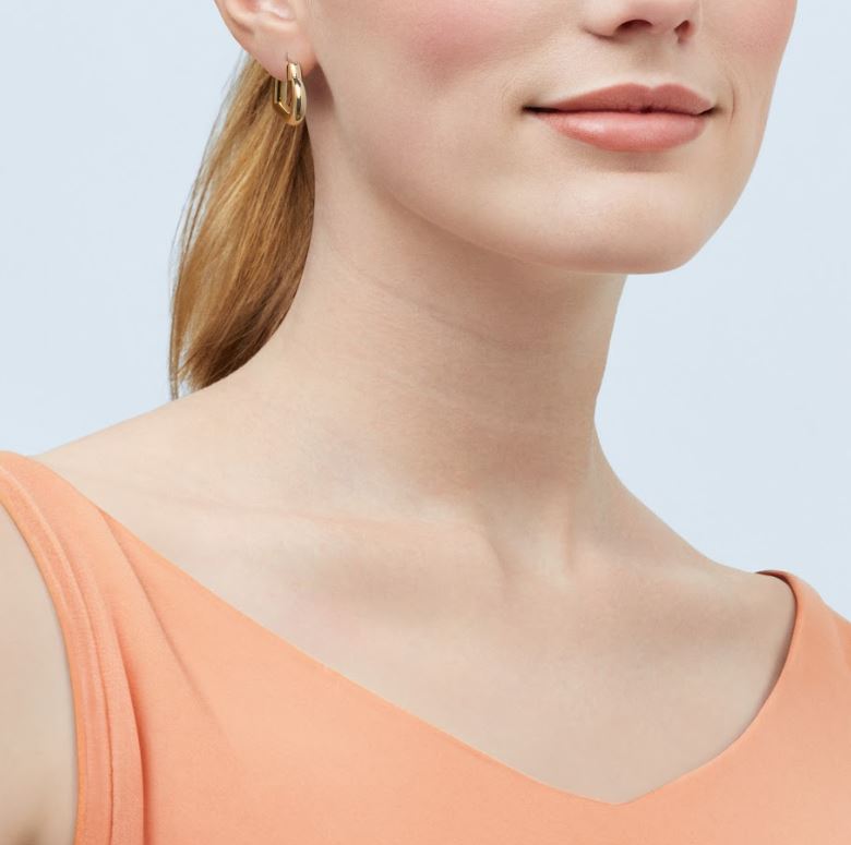 14K yellow gold medium hoop earrings.