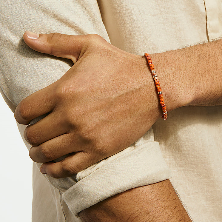 Sterling silver bracelet with colorful gemstone and enamel beads.