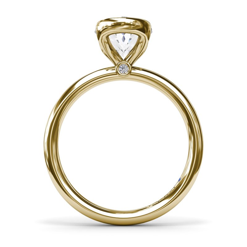 14K yellow gold solitaire diamond ring.
