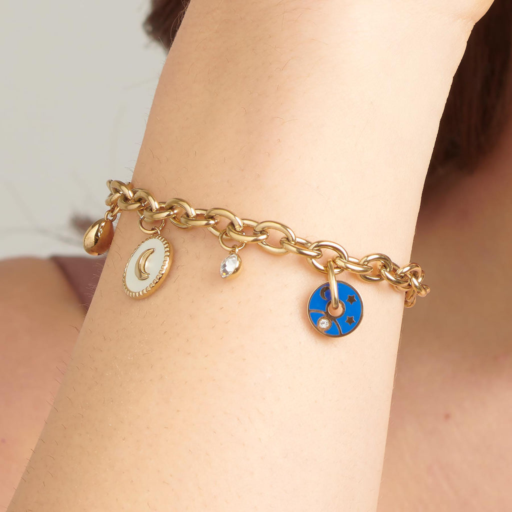 Yellow stainless steel bracelet with moon charms.