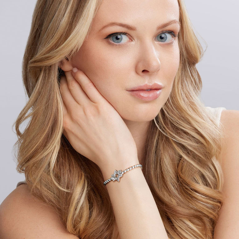 Sterling silver stretch bracelet, star design.