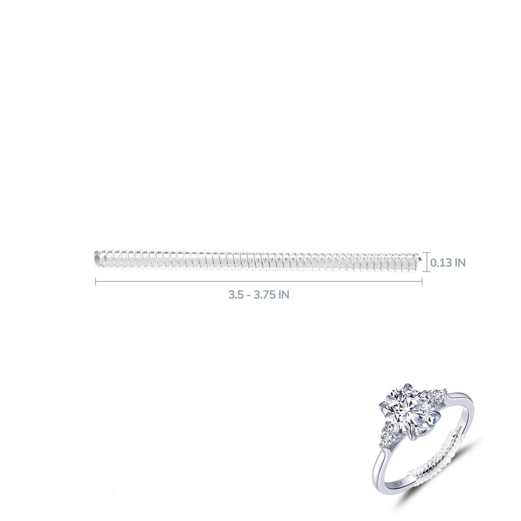 Emerald-cut ruby ring with diamond accents.