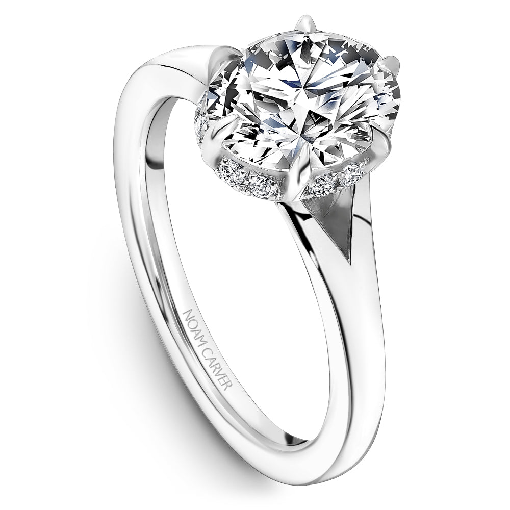 Solitaire diamond ring, 14K white gold, prong setting.