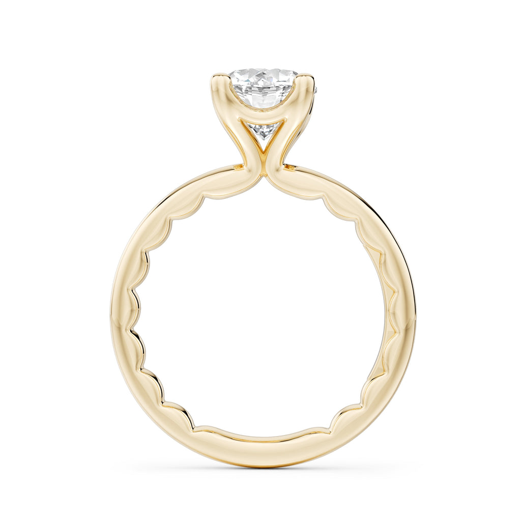 14K yellow gold diamond solitaire ring.