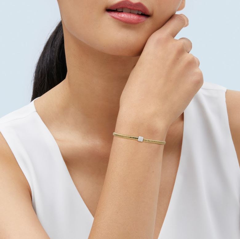 14k yellow gold bracelet with round diamonds.