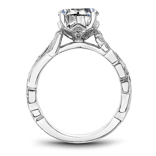 White gold ring with diamond accents.