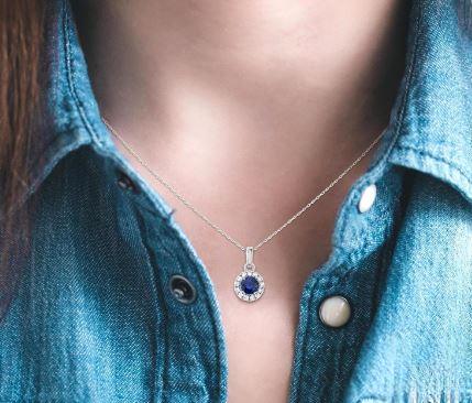 Sapphire pendant on white gold chain.