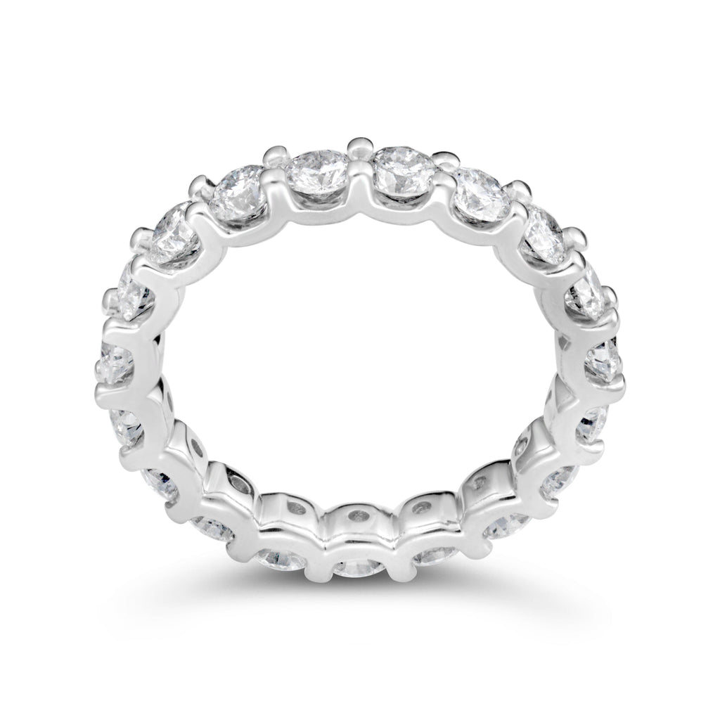14K white gold band with round diamonds.