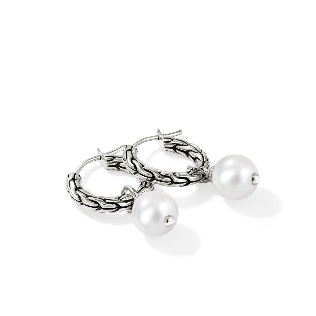 Sterling silver hoops with cultured pearls.