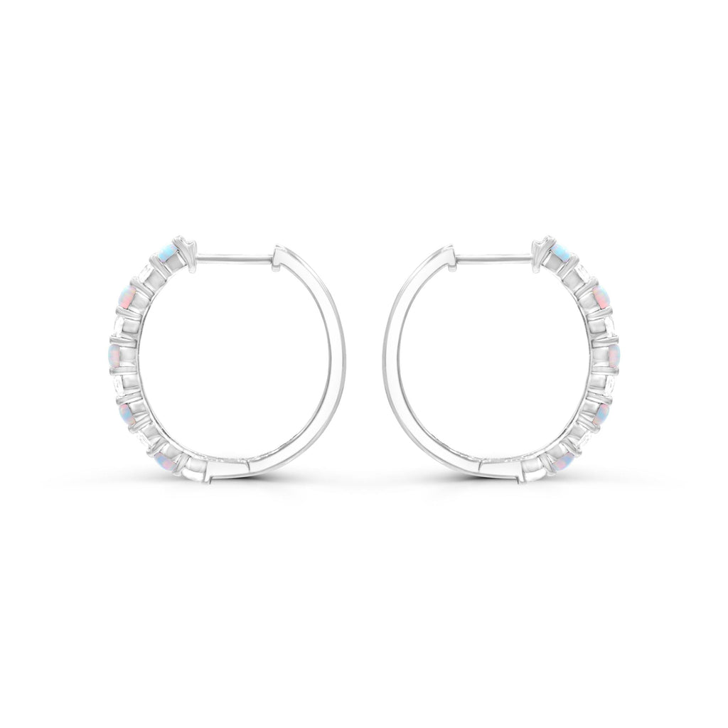 Sterling silver hoops with opal gemstones.