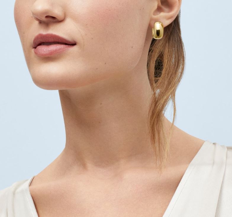 14K yellow gold medium hoop earrings.