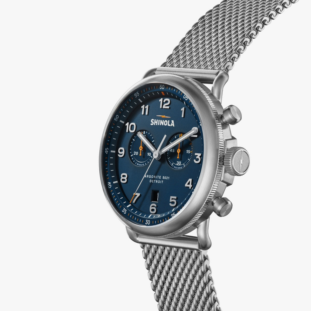 Stainless steel watch, dark blue dial.