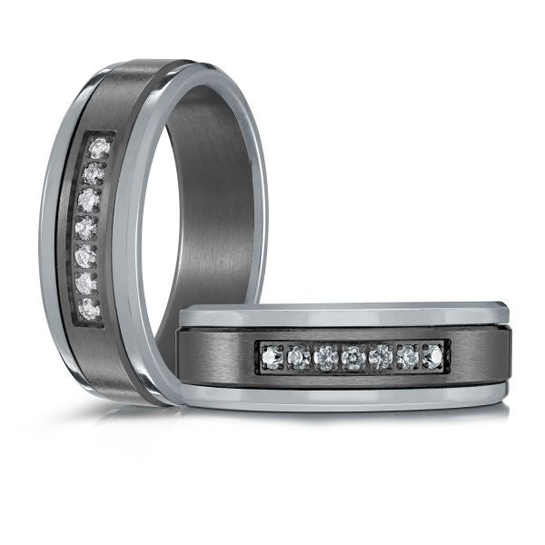 Tantalum band with seven round diamonds.