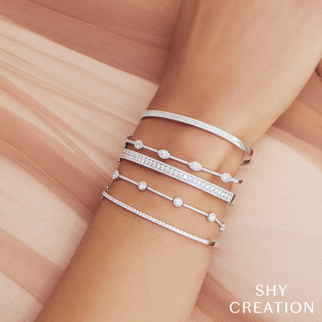 Rose gold bracelet with round diamonds.