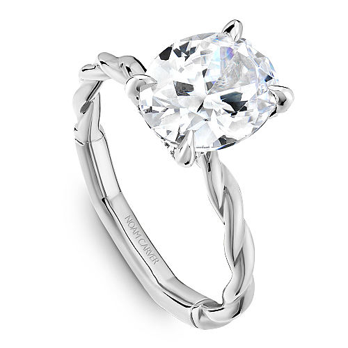 14K white gold ring with hidden diamond accents.