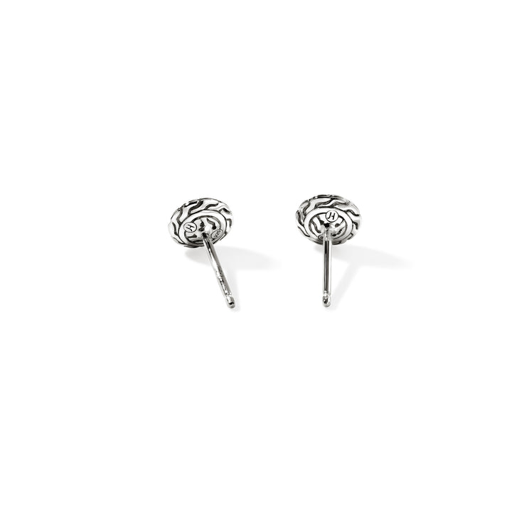 Sterling silver stud earrings with blue gemstones.
