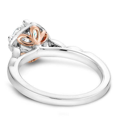 White-rose gold ring with diamond accents.