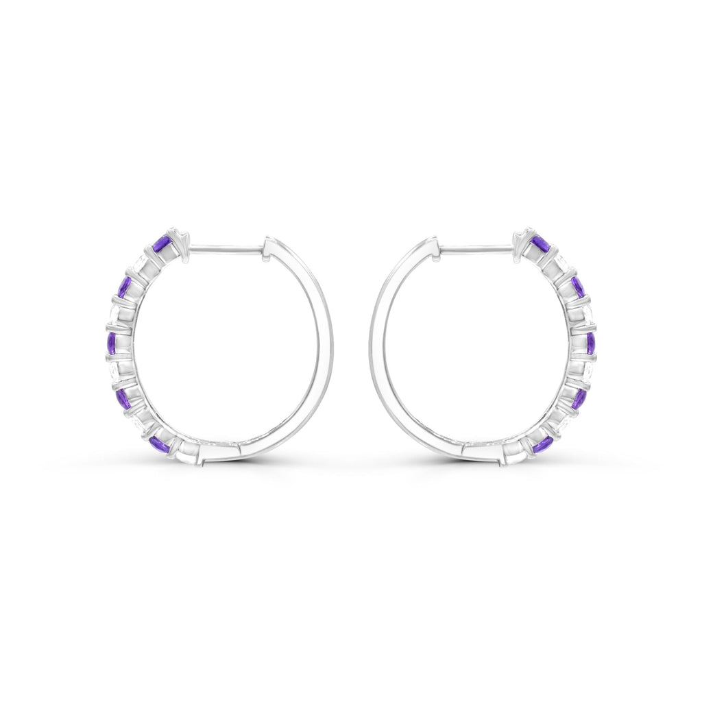 Sterling silver hoops with purple amethysts.