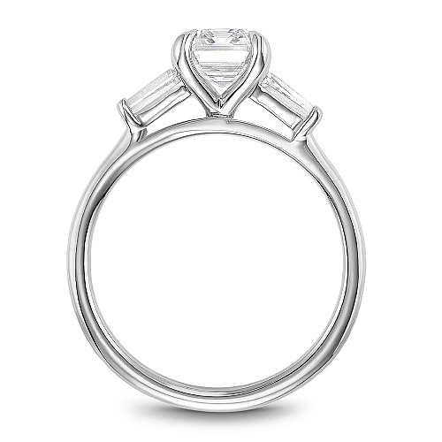 Three-stone diamond ring with baguettes.