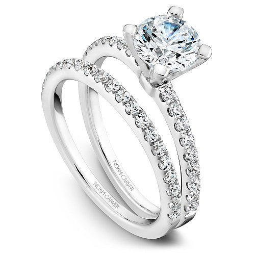 White gold ring with round diamonds.