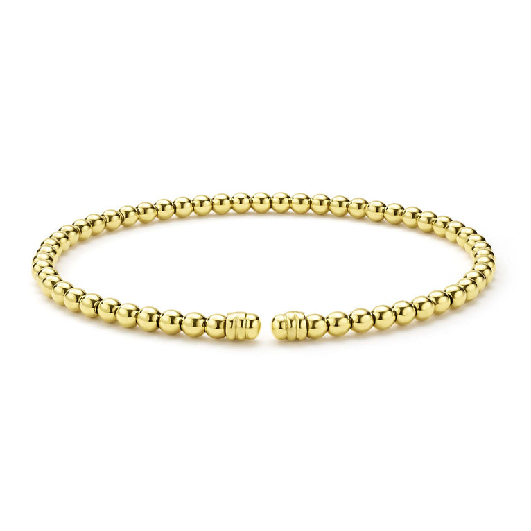 Gold beaded cuff bracelet, open design.